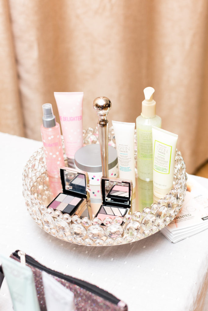 Rhinestone stand with a variety of Mary Kay Makeup products at Little Birds Photography's Glitter & Glam Night