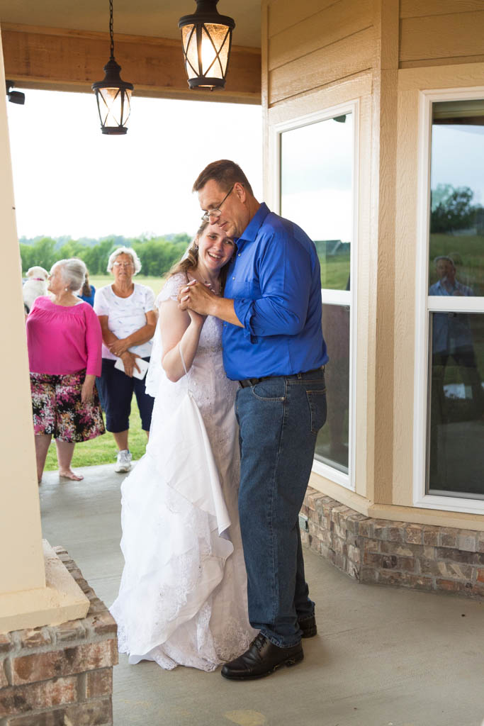 bride laughs during the father daughter dance