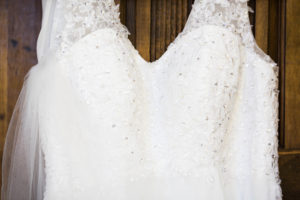 closeup of lace and beaded wedding dress