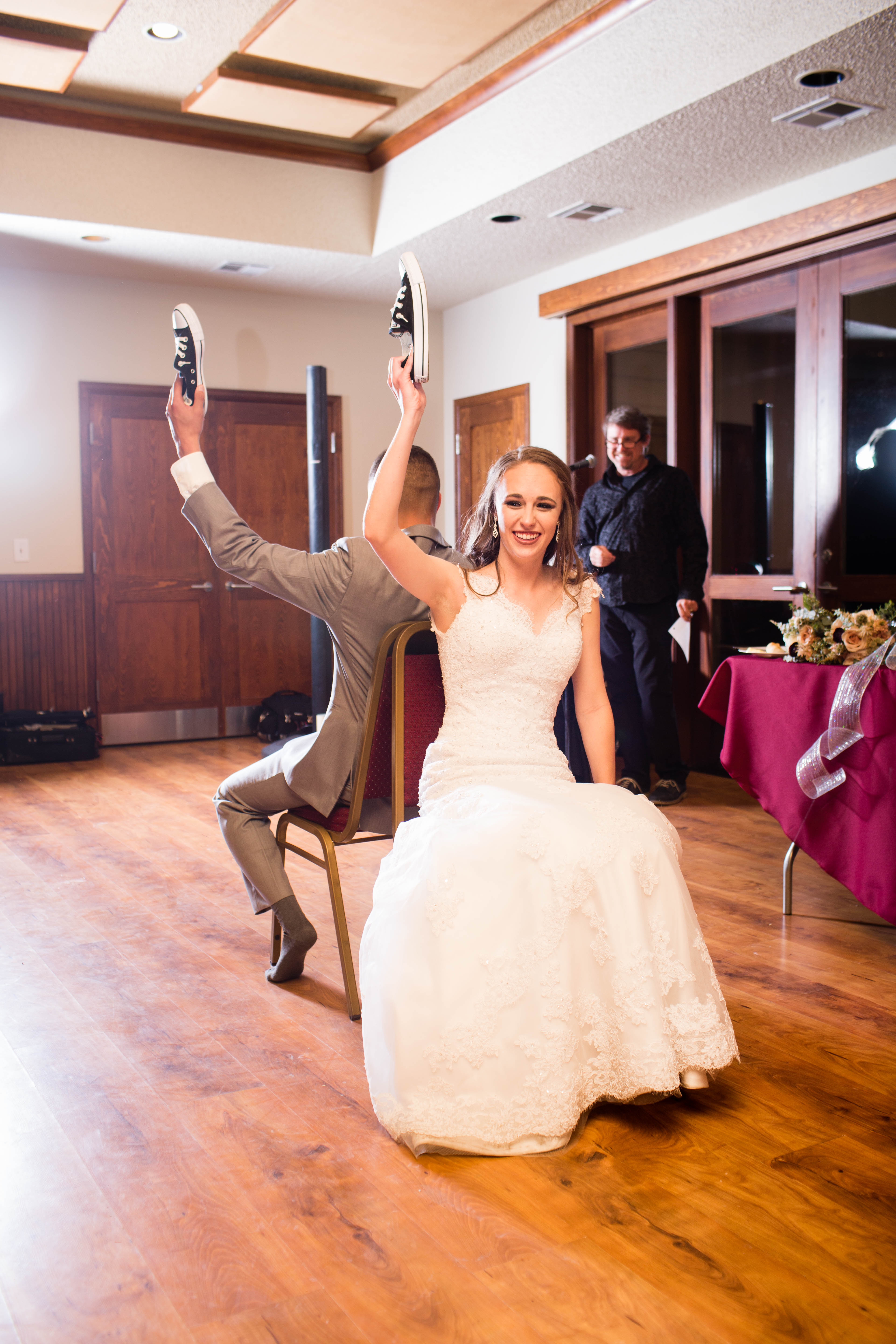 bride smiles during the Newlywed Game at reception
