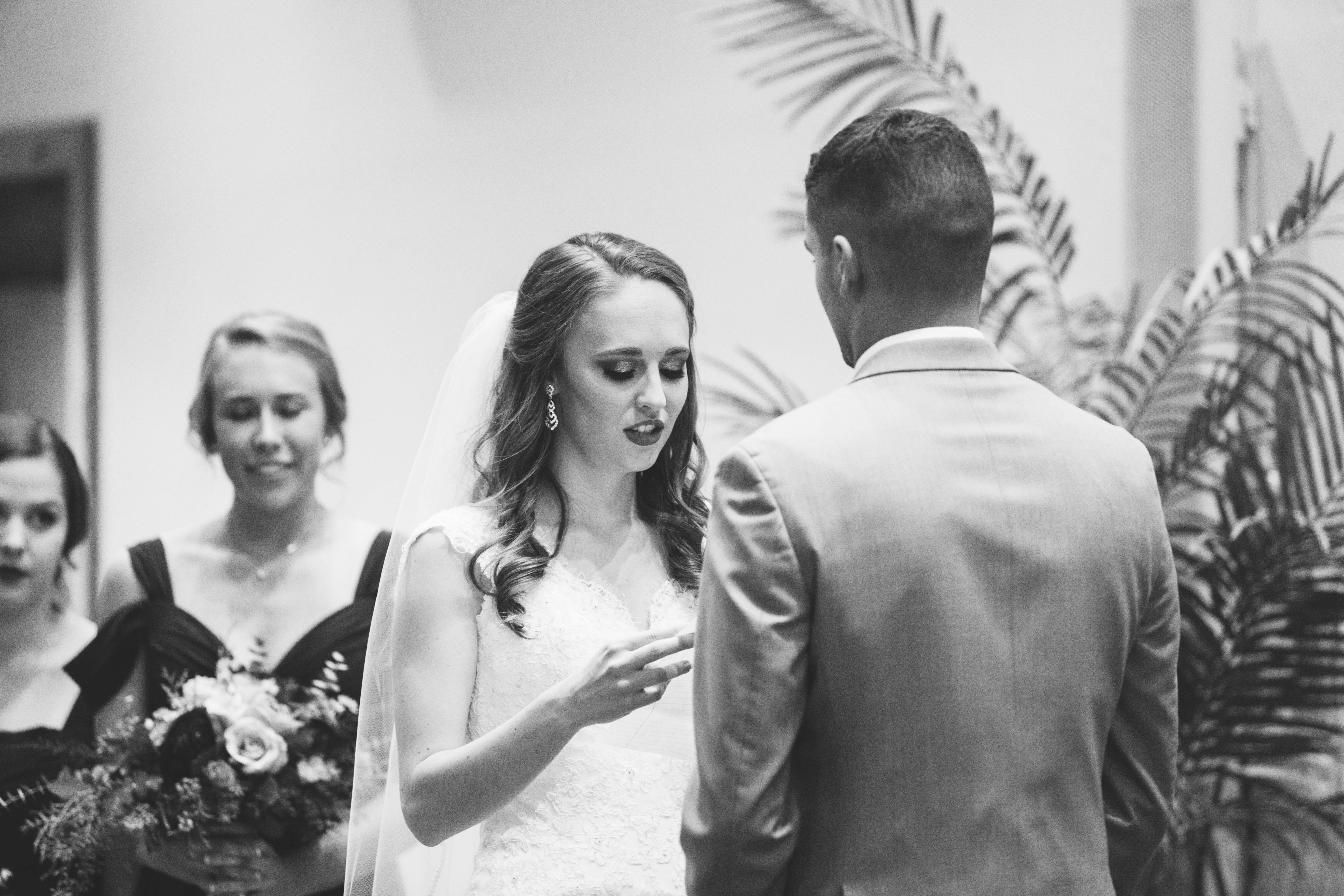 bride reads her vows to the groom