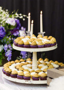 tower with cupcakes at wedding reception