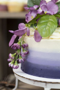 closeup of floral decoration on wedding cake