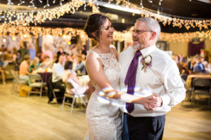 Father and bride dance at reception
