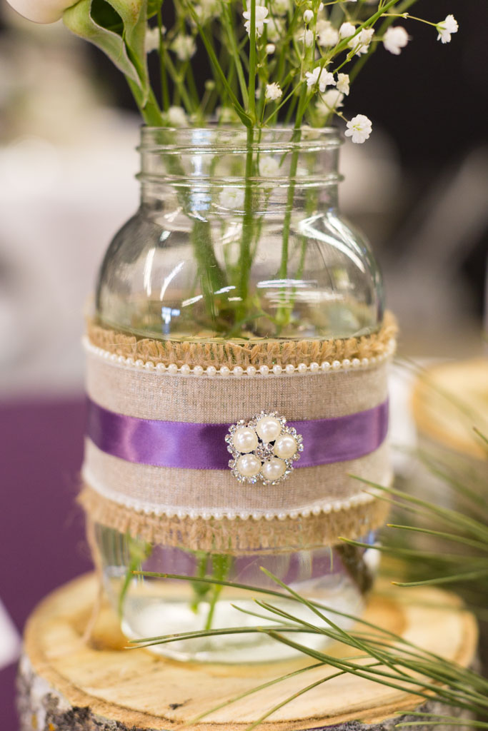 mason jar decorated with burlap, ribbon and beads